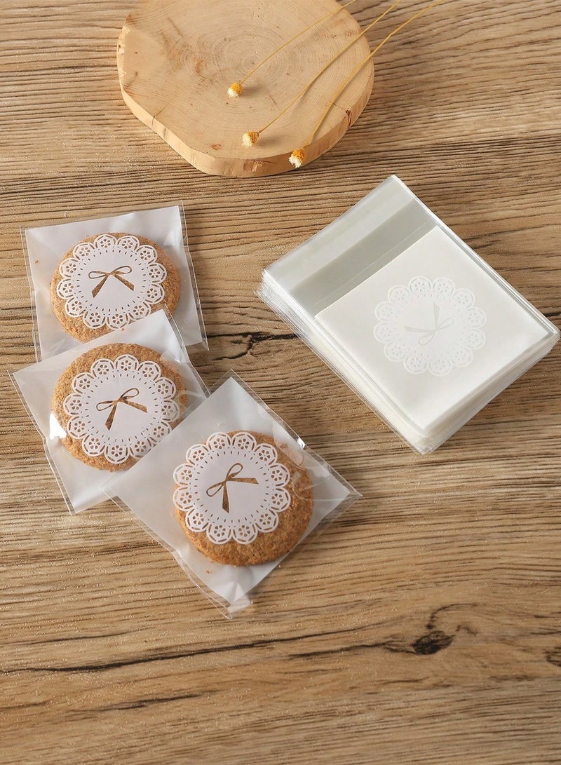 كوكنا أكياس تغليف حلويات، ذاتية اللصق بنمط فيونكة بيضاء، أكياس هدايا شفافة لعيد مبارك، أكياس صغيرة للبسكويت والشوكولاتة، 7x10 سم، 100 قطعة - Image 4